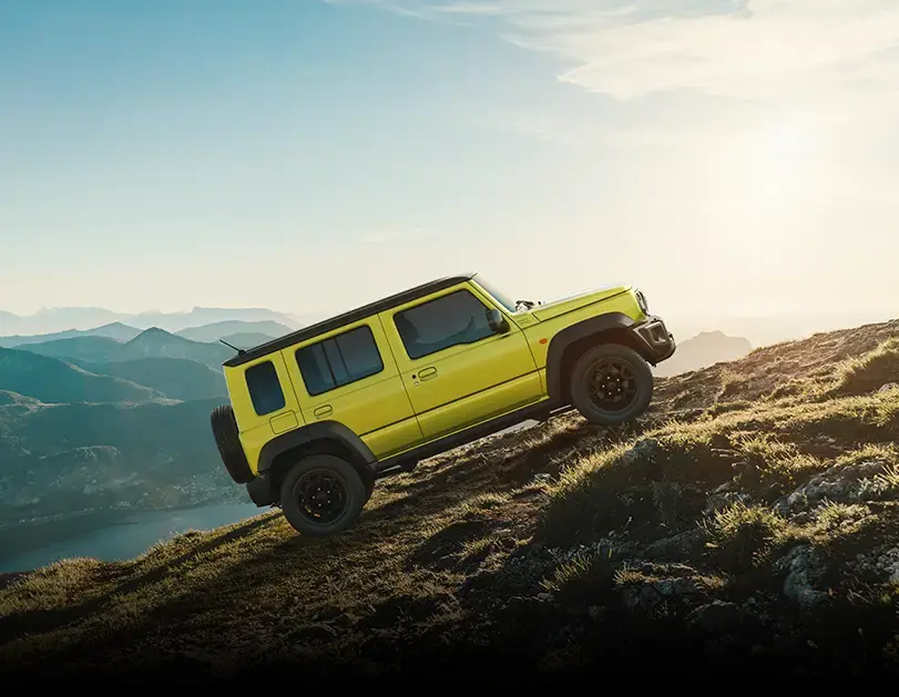 //az-ci-afde-prd-nexa-01-dkcjcehxewgpebhe.z01.azurefd.net/-/media/feature/nexawebsitecarbrand/rocky/brand-safety/811x629-ar_sn_jimny_hill-descent-control-shot_v1-copy.webp